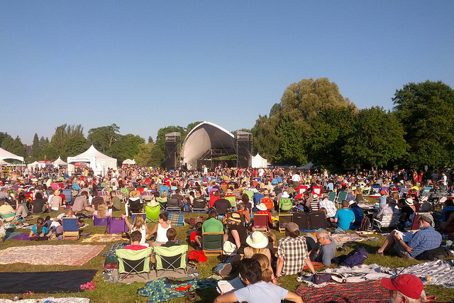 Photo of crown sitting on grassy field at Vancouver Folk Music Festival