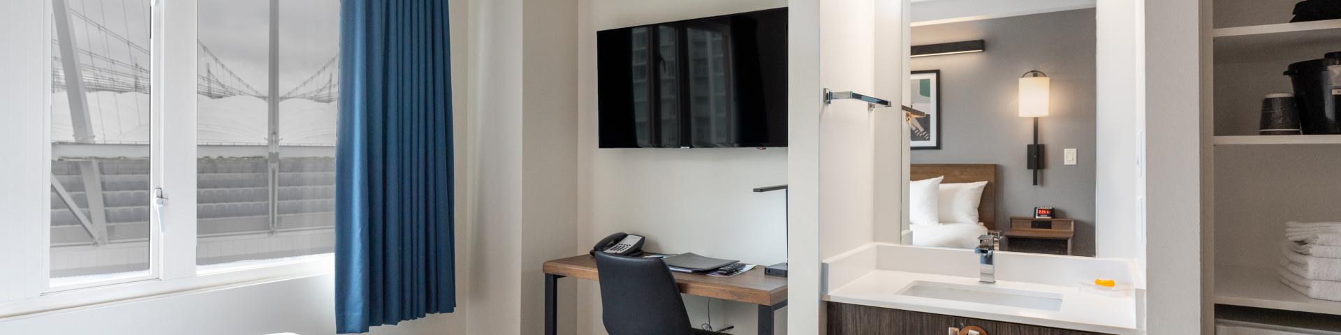 Desk and sink in long-term residency rooms at Hotel Willo