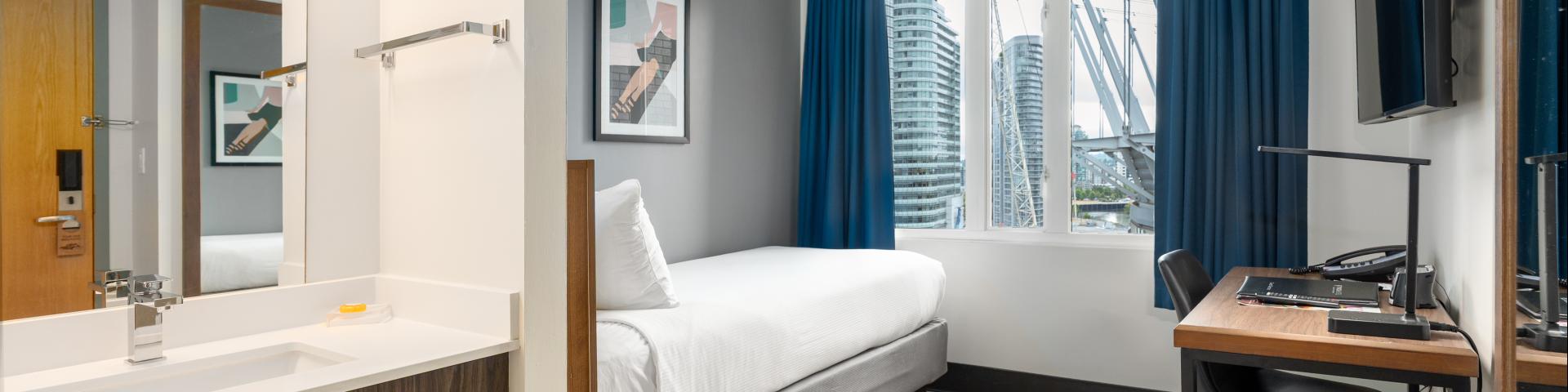 Single Bed Room with Desk and Vanity for Residents